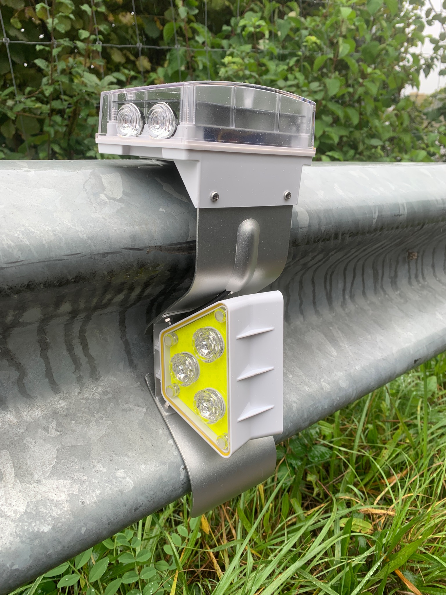 Close-up of the SolarVision SV5 guardrail bracket and LED lights